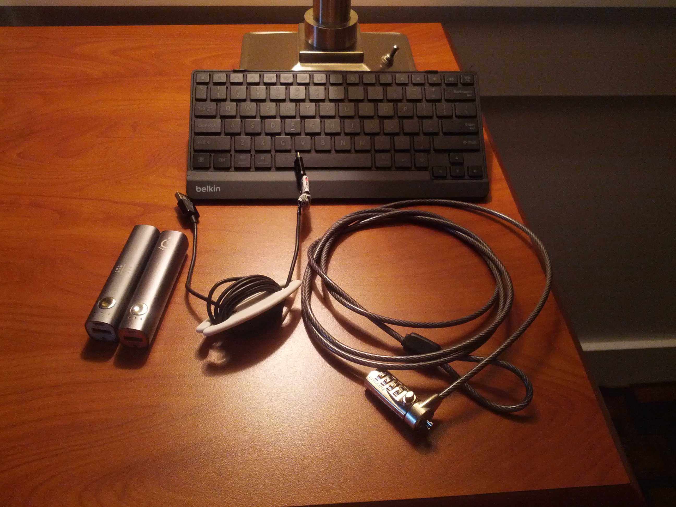 Bluetooth keyboard, backup batteries, cord wrangler, and laptop lock.